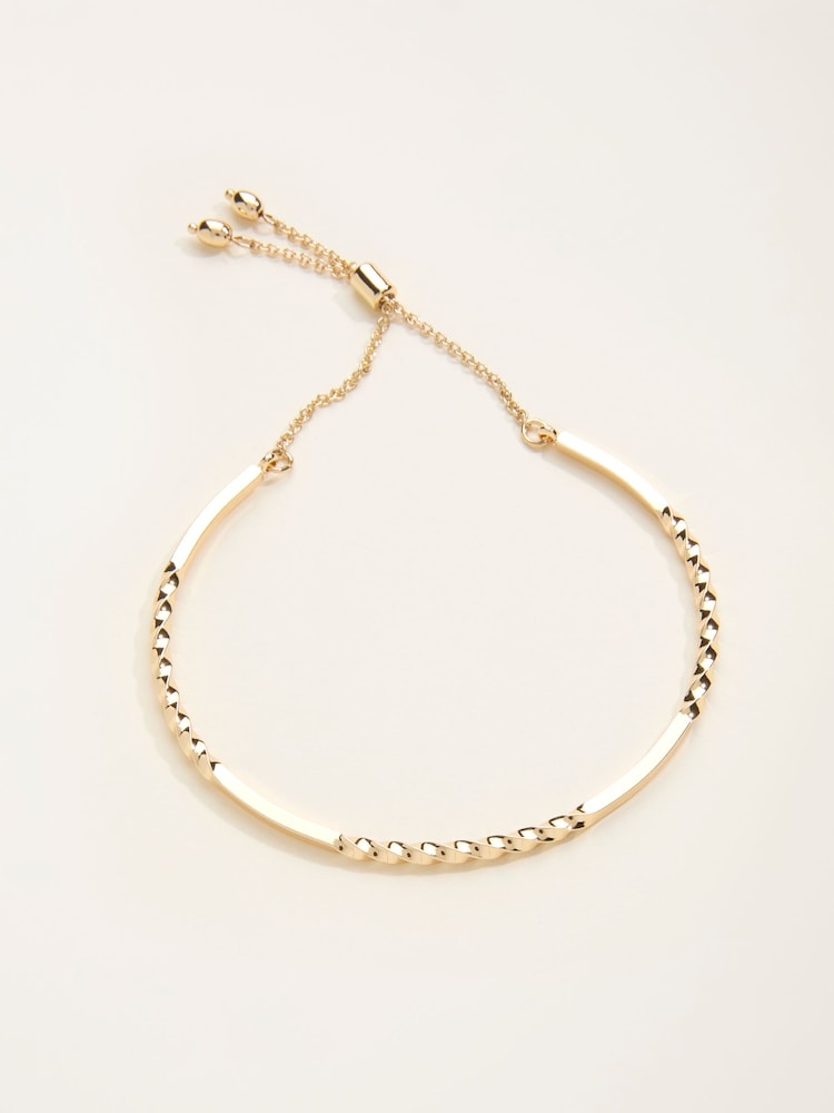 FatFace Gold Tone Twist Adjustable Bracelet - Image 1 of 2 FatFace Gold Tone Twist Adjustable Bracelet - Image 1 of 2