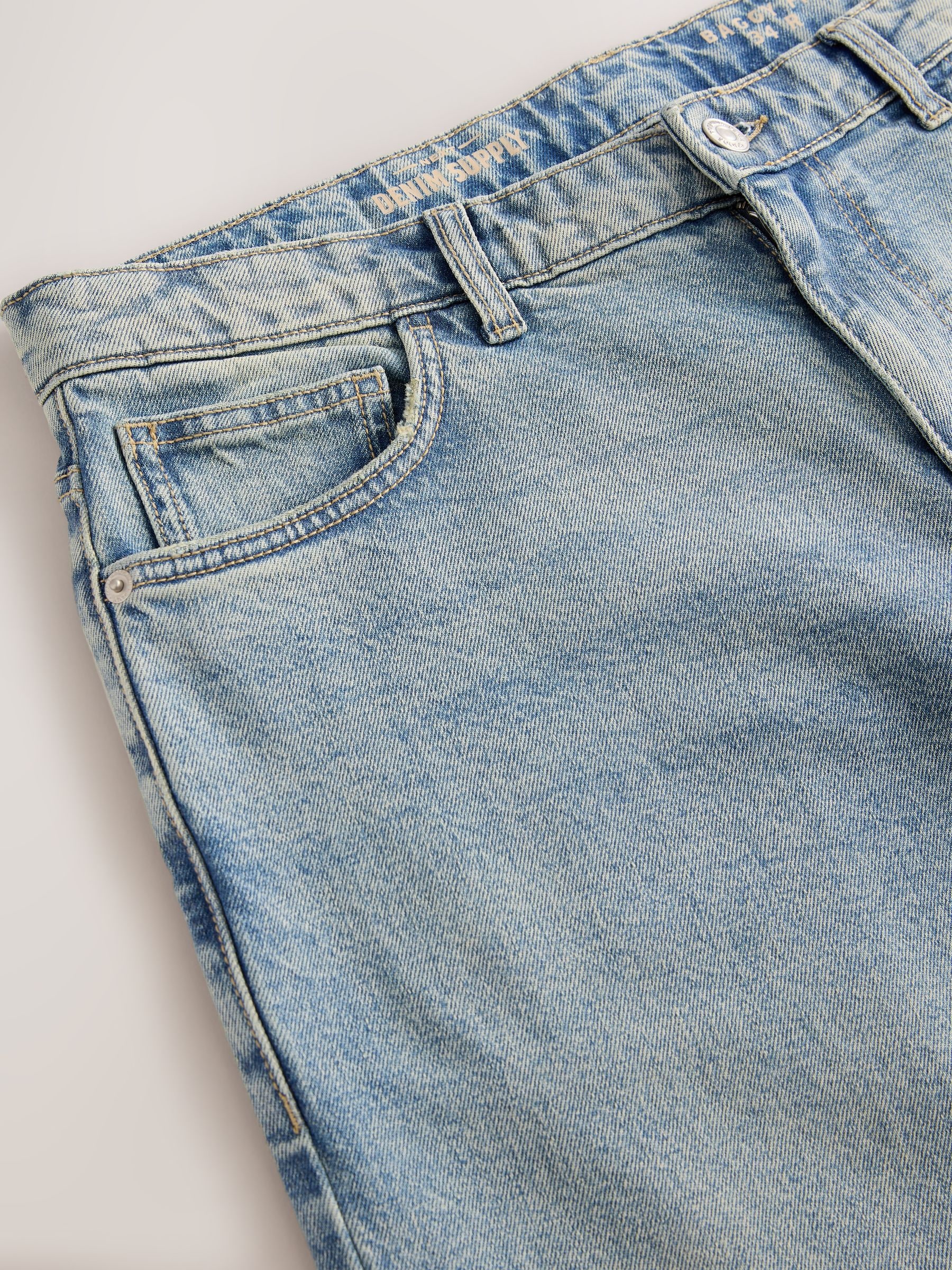 Buy Blue Light Tint Baggy Fit Vintage Wash Denim Jeans from Next USA