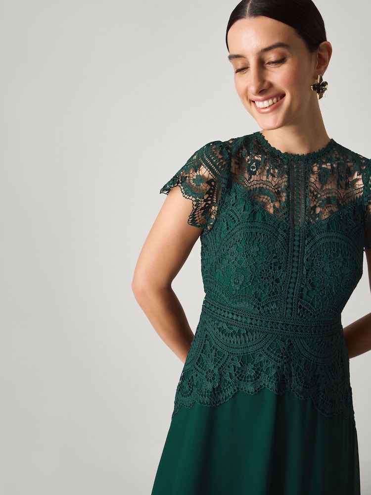 green emerald velvet dress The Poppy Dress