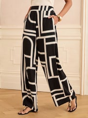Love & Roses Black White Geo Print Wide Leg Trousers - Image 1 of 4