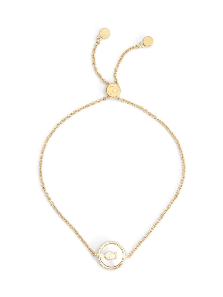 COACH Gold Tone Signature Mother of Pearl Coin Slider Bracelet - Image 1 of 3