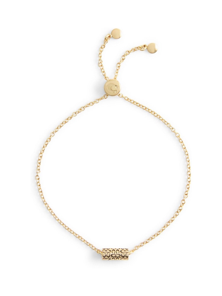 COACH Gold Tone Signature Quilted Tube Slider Bracelet - Image 1 of 4
