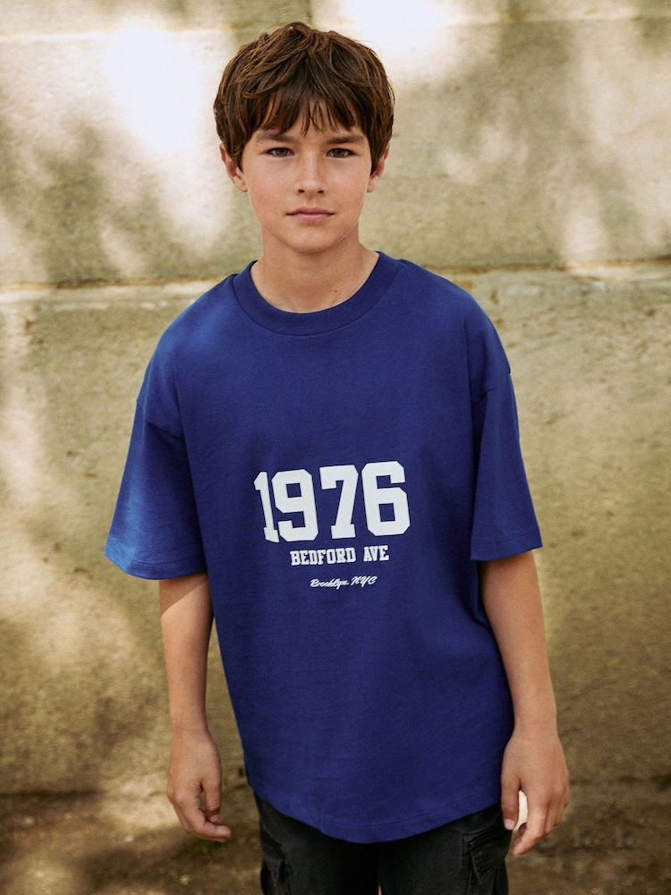 Cobalt Blue Varsity Relaxed Fit Short Sleeve Graphic Print T-Shirt (3-16yrs) - Image 1 of 6 Cobalt Blue Varsity Relaxed Fit Short Sleeve Graphic Print T-Shirt (3-16yrs) - Image 1 of 6
