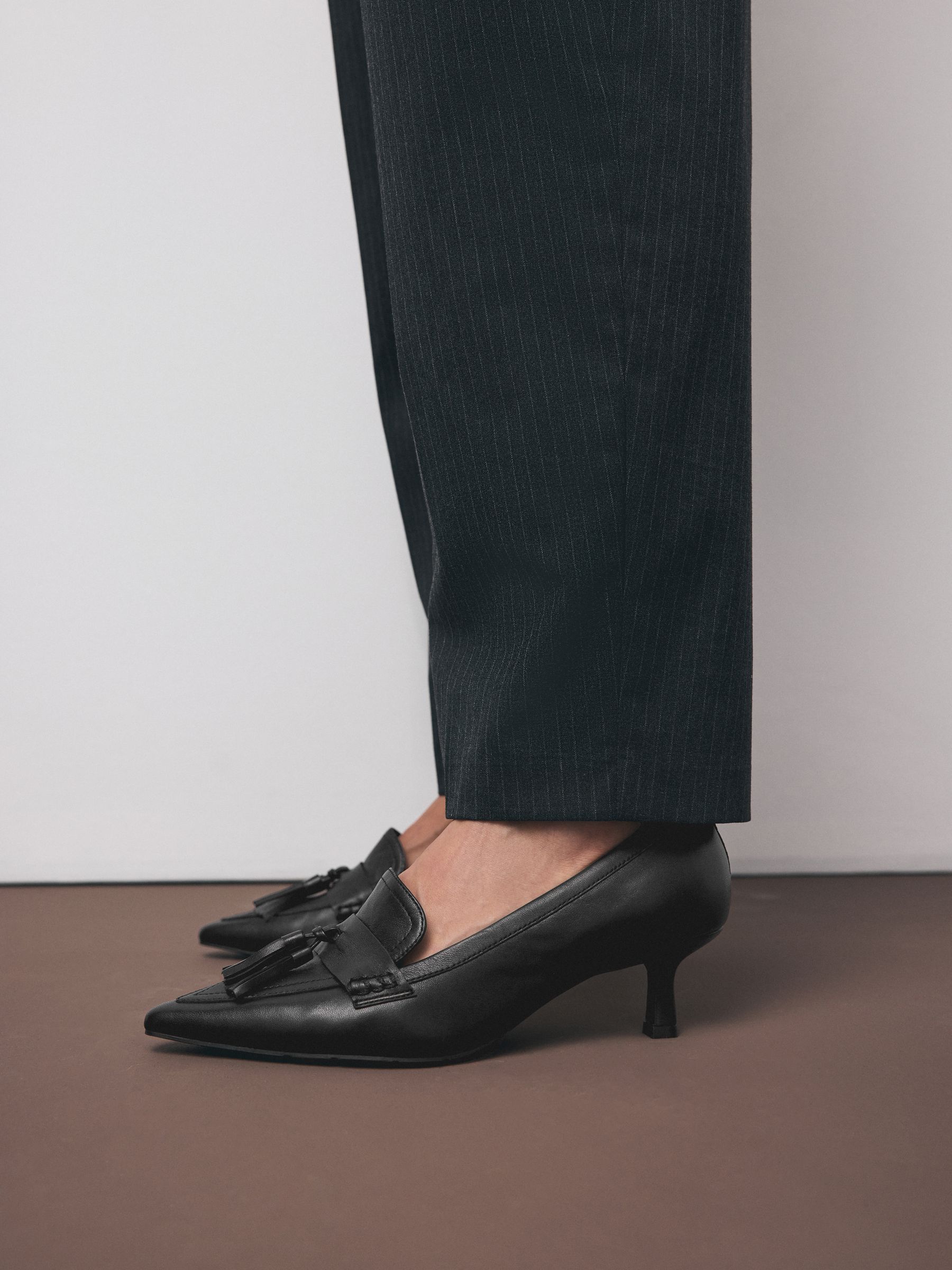 Buy Black Premium Leather With Motionflex Point Toe Tassel Heels