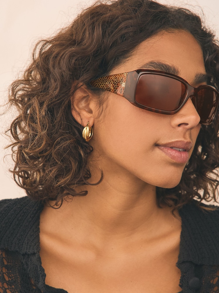 Tortoiseshell Brown Wrap Around Sunglasses - Image 1 of 4 Tortoiseshell Brown Wrap Around Sunglasses - Image 1 of 4