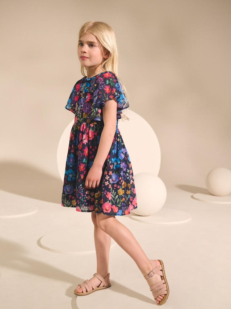 Marineblau geblümt - Kleid mit Engelsärmeln und Verzierungen (3–16 Jahre) - Bild 2 von 4