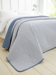 Catherine Lansfield Chambray Blue Stripe Quilted Reversible Bedspread - Image 1 of 4