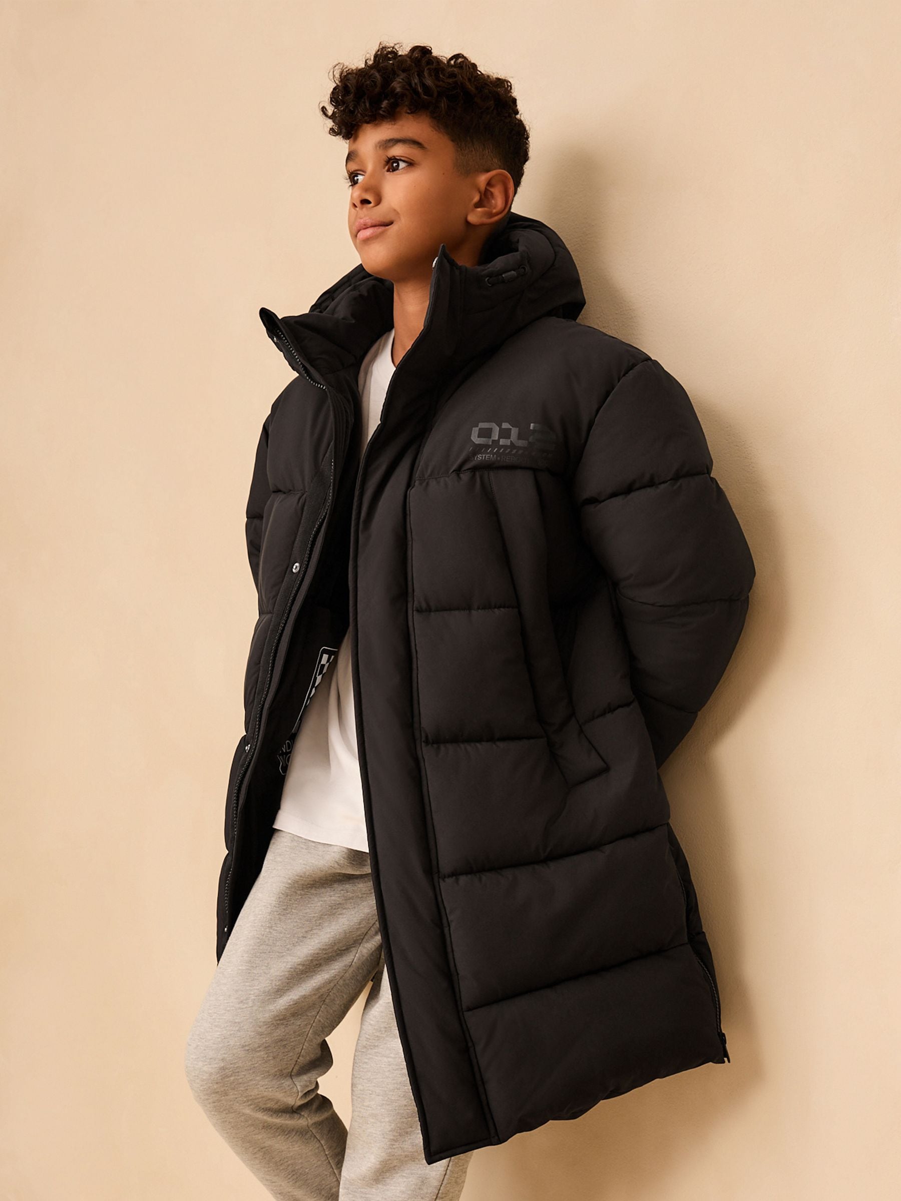 Buy Black Longline Shower Resistant Padded Coat (3-17yrs) from the