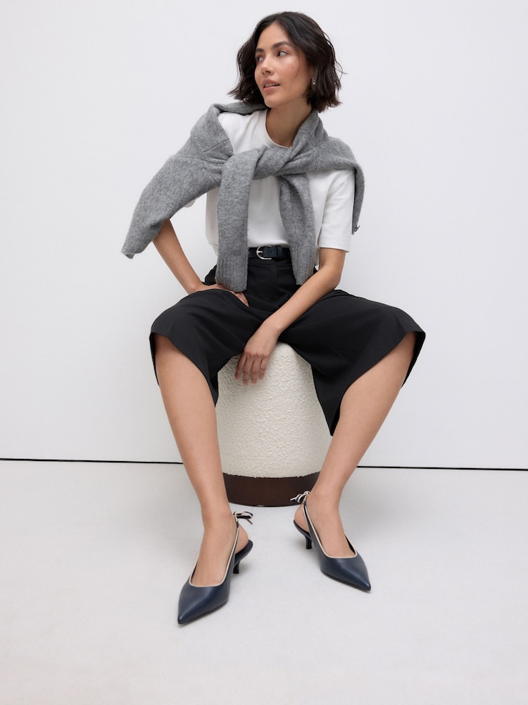 Navy Forever Comfort® Premium Leather Pointed Toe Bow Slingback Heels - Image 1 of 12 Navy Forever Comfort® Premium Leather Pointed Toe Bow Slingback Heels - Image 1 of 12