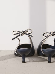 Navy Forever Comfort® Premium Leather Pointed Toe Bow Slingback Heels - Image 10 of 12