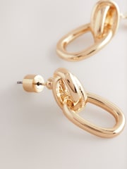 Tono dorado - Pendientes de botón con diseño de aldaba - Imagen 2 de 3