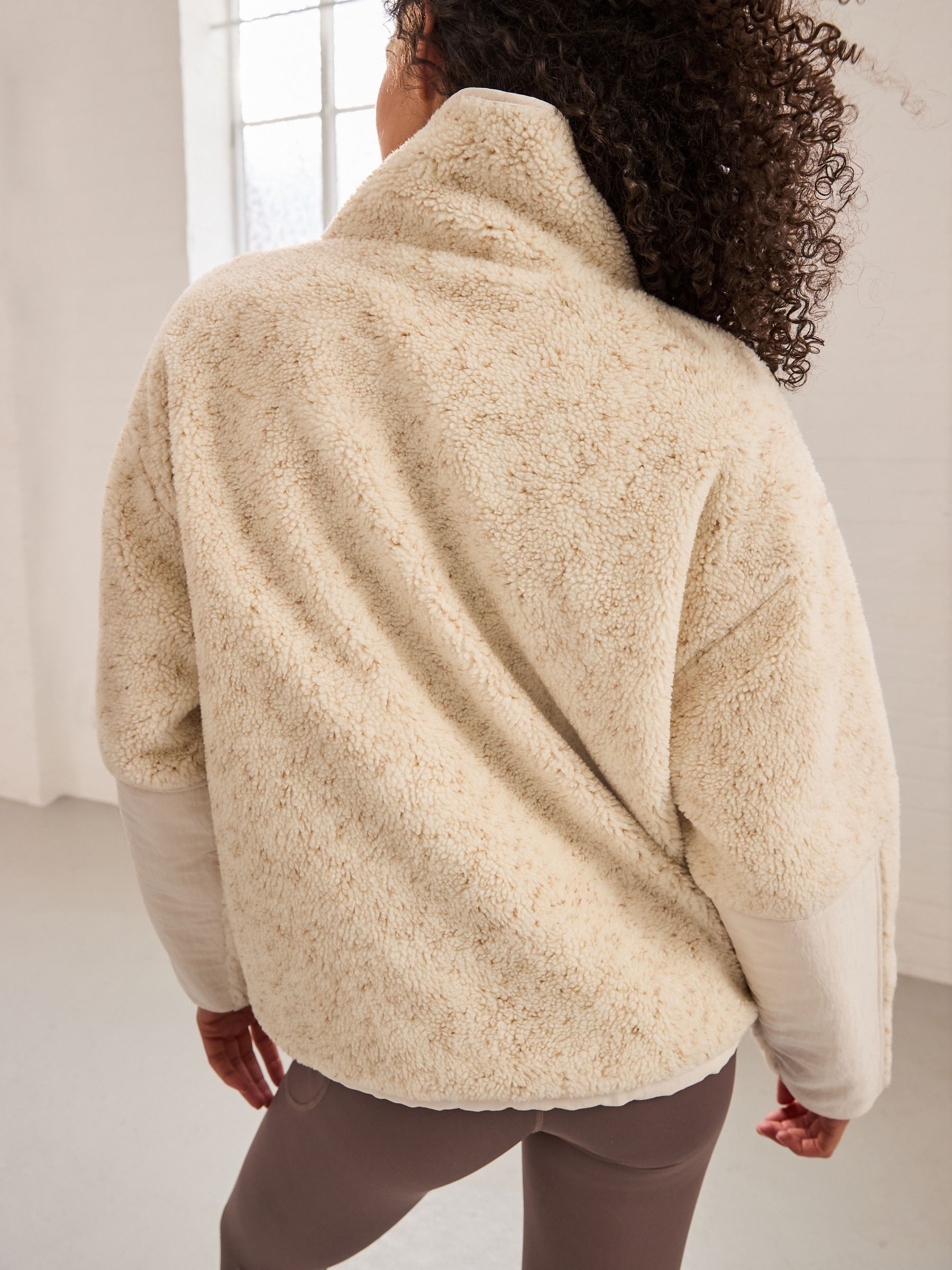 Buy Cream Marl Teddy Borg Zip Through Fleece Jacket from the Next
