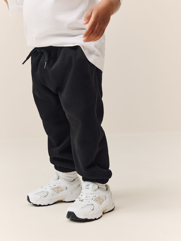 Black Regular Fit Soft Touch Jersey Joggers (3mths-7yrs) - Image 1 of 7 Black Regular Fit Soft Touch Jersey Joggers (3mths-7yrs) - Image 1 of 7
