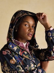 Joules Holkham Navy Bird Floral Waterproof Packable Raincoat With Hood - Image 9 of 14