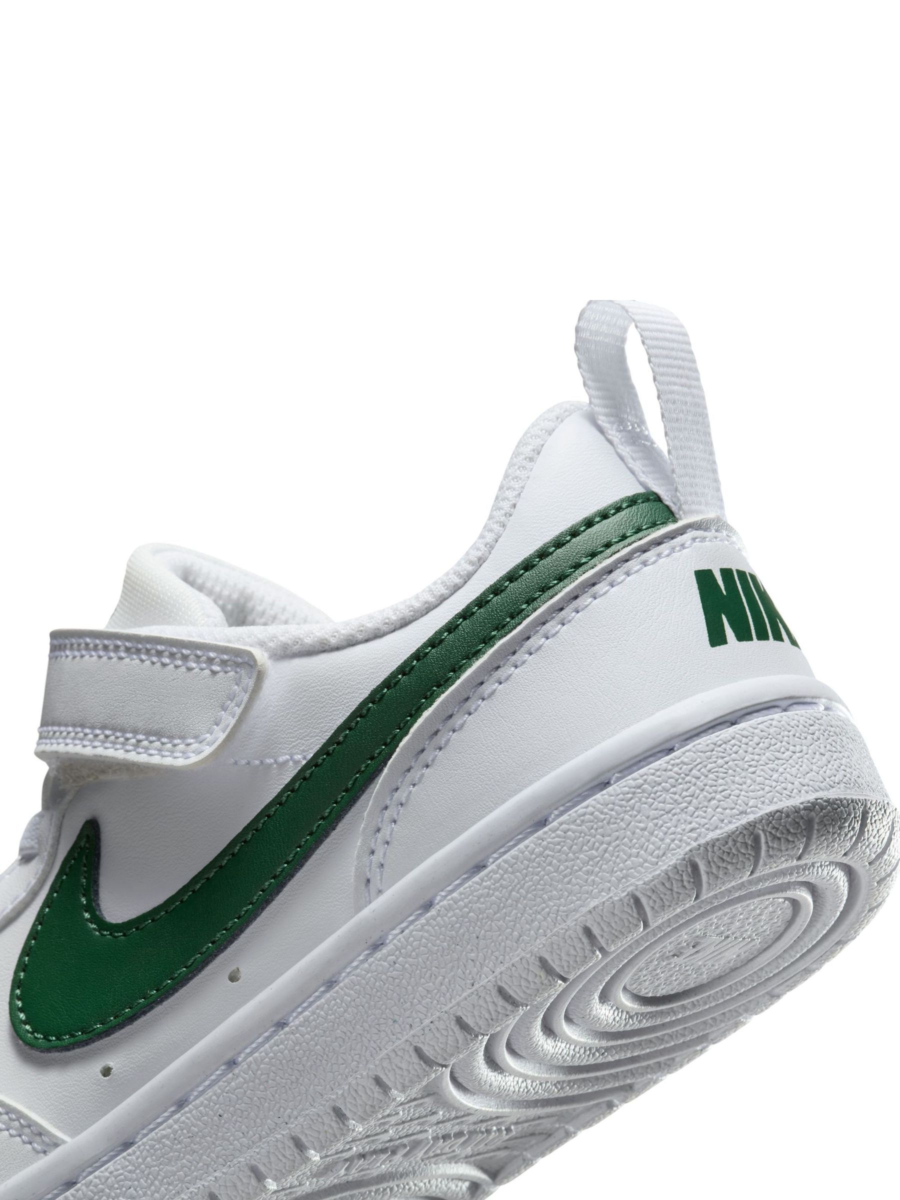 green nike junior trainers