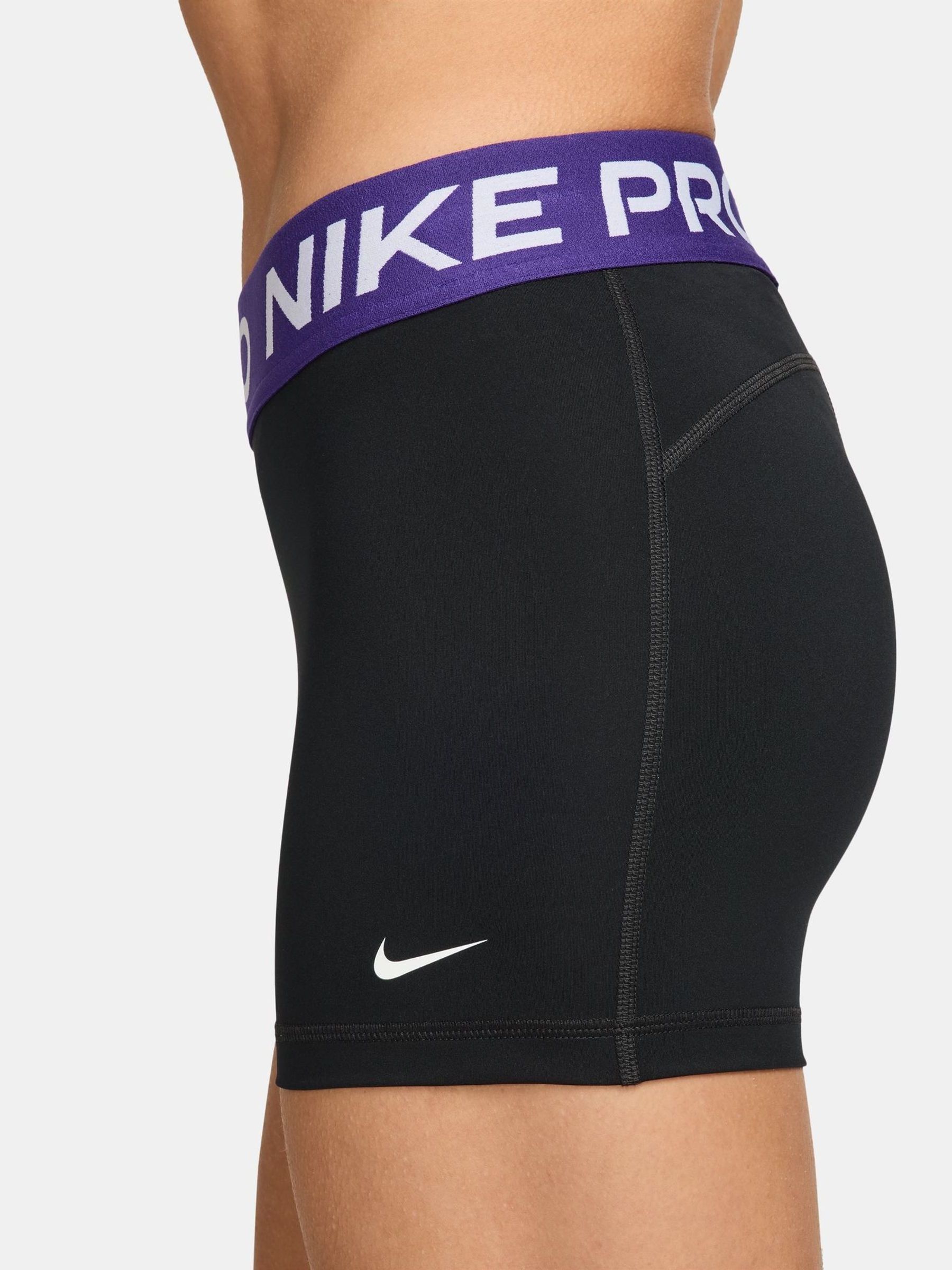 women's nike pro shorts purple