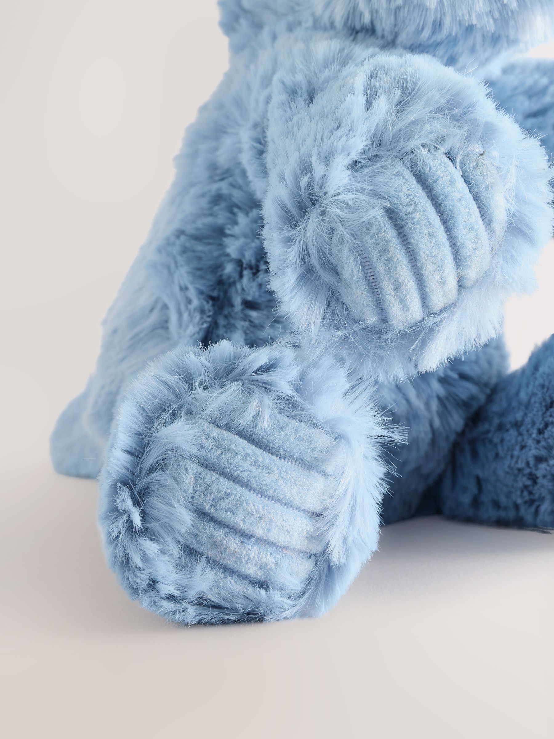 Buy Blue Dinosaur Soft Plush Toy from Next Ireland