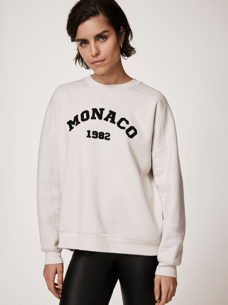 كريم - Mint Velvet Monaco Graphic Sweatshirt - صورة 2 من 8