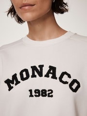 كريم - Mint Velvet Monaco Graphic Sweatshirt - صورة 3 من 8