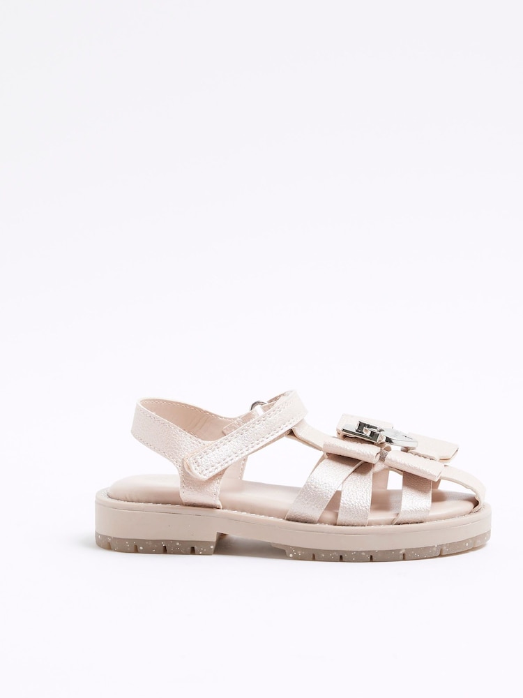 وردي - صندل بأحزمة مزيّن بفيونكة للبنات من River Island - Image 1 of 5