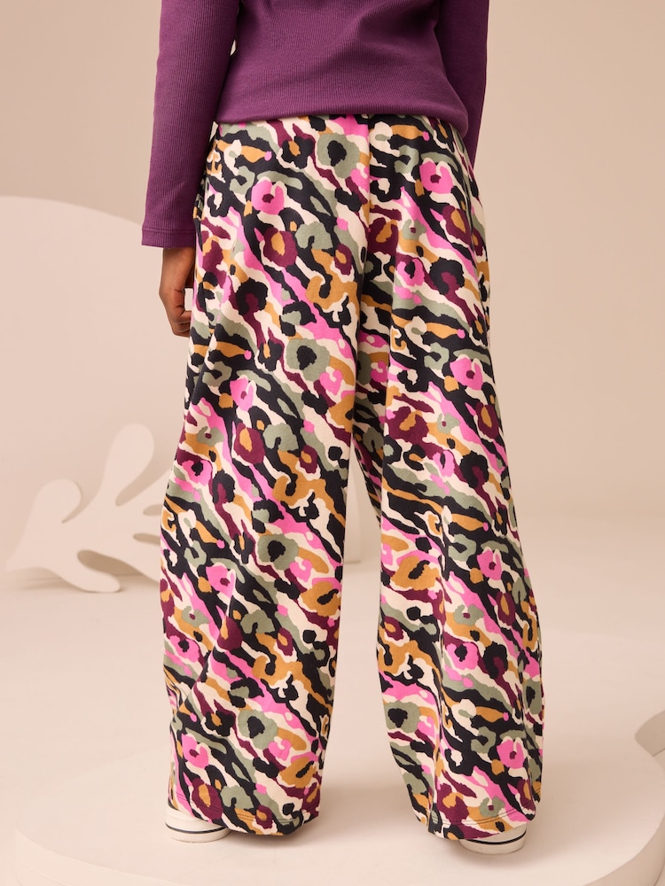 Pink/Green Abstract Animal Print 1 Pack Wide Leg Jersey Trousers (3-16yrs) - Image 2 of 9 Pink/Green Abstract Animal Print 1 Pack Wide Leg Jersey Trousers (3-16yrs) - Image 2 of 9