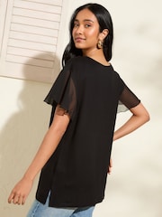 Friends Like These Black Short Sleeve Flutter Trim Tunic - Image 4 of 4