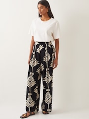 Monsoon Black Pamela Leaf Print Wide Leg Trousers - Image 1 of 4