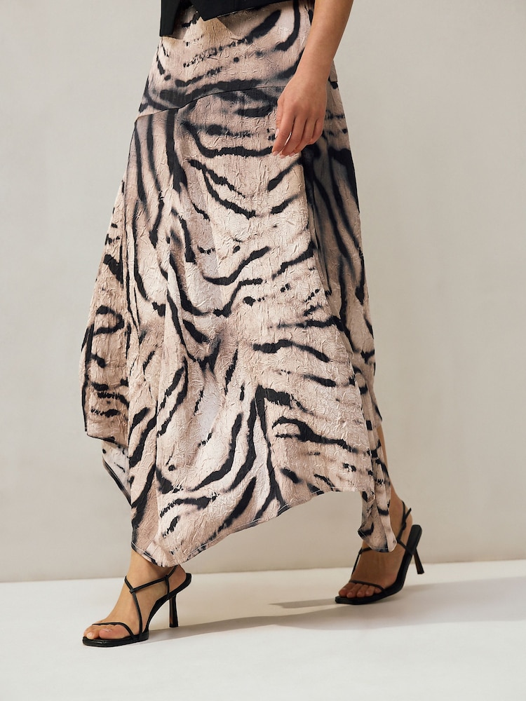 Buy Ecru Zebra Print Crinkle Satin Asymetric Midi Skirt from the