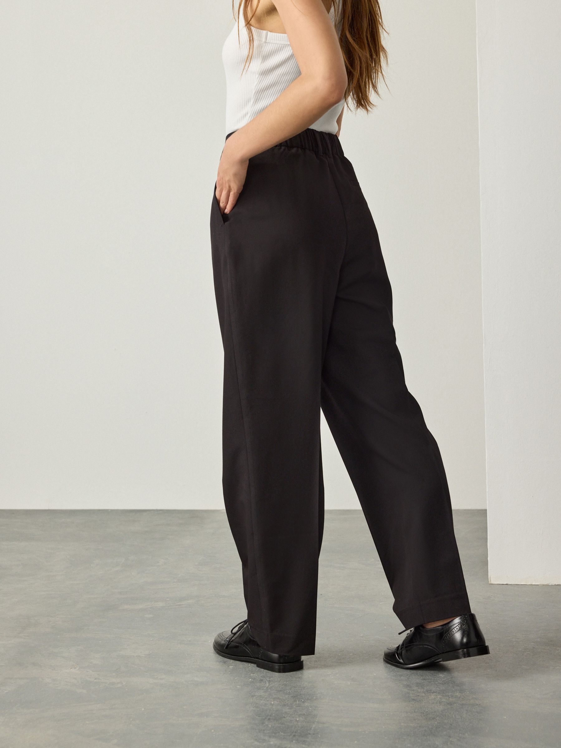 Buy Black Tailored Tapered Trousers from Next USA