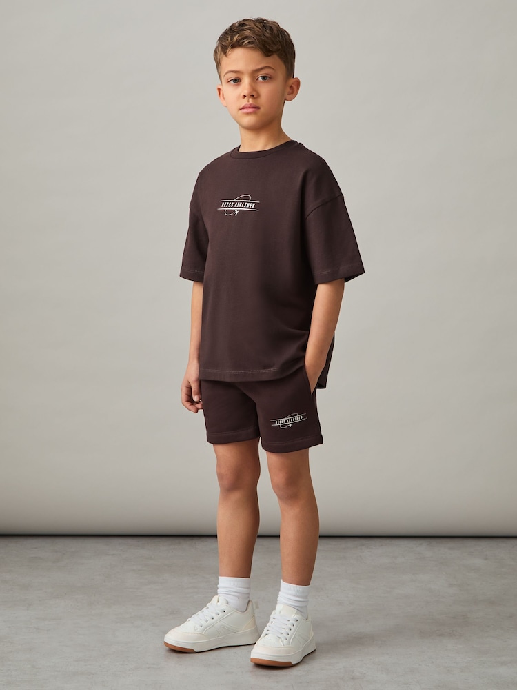 Reiss Chocolate Brown/Off White Hughes Cotton-Blend Airlines-Print Shorts - Image 1 of 4