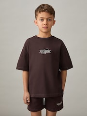 Reiss Chocolate Brown/Off White Ivan 9-13 yrs Cotton Airlines-Print Oversize T-Shirt - Image 3 of 4