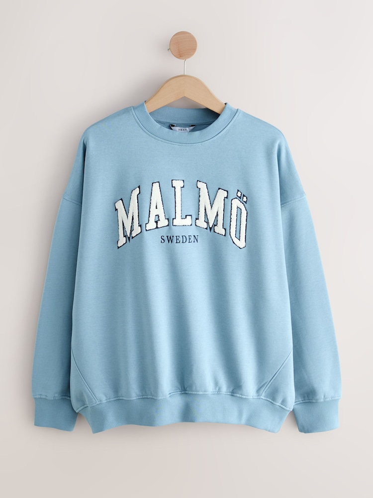 Pretty Blue Malmö Sweden Relaxed Fit Boucle Summer City Graphic Print Sweatshirt - Image 1 of 3