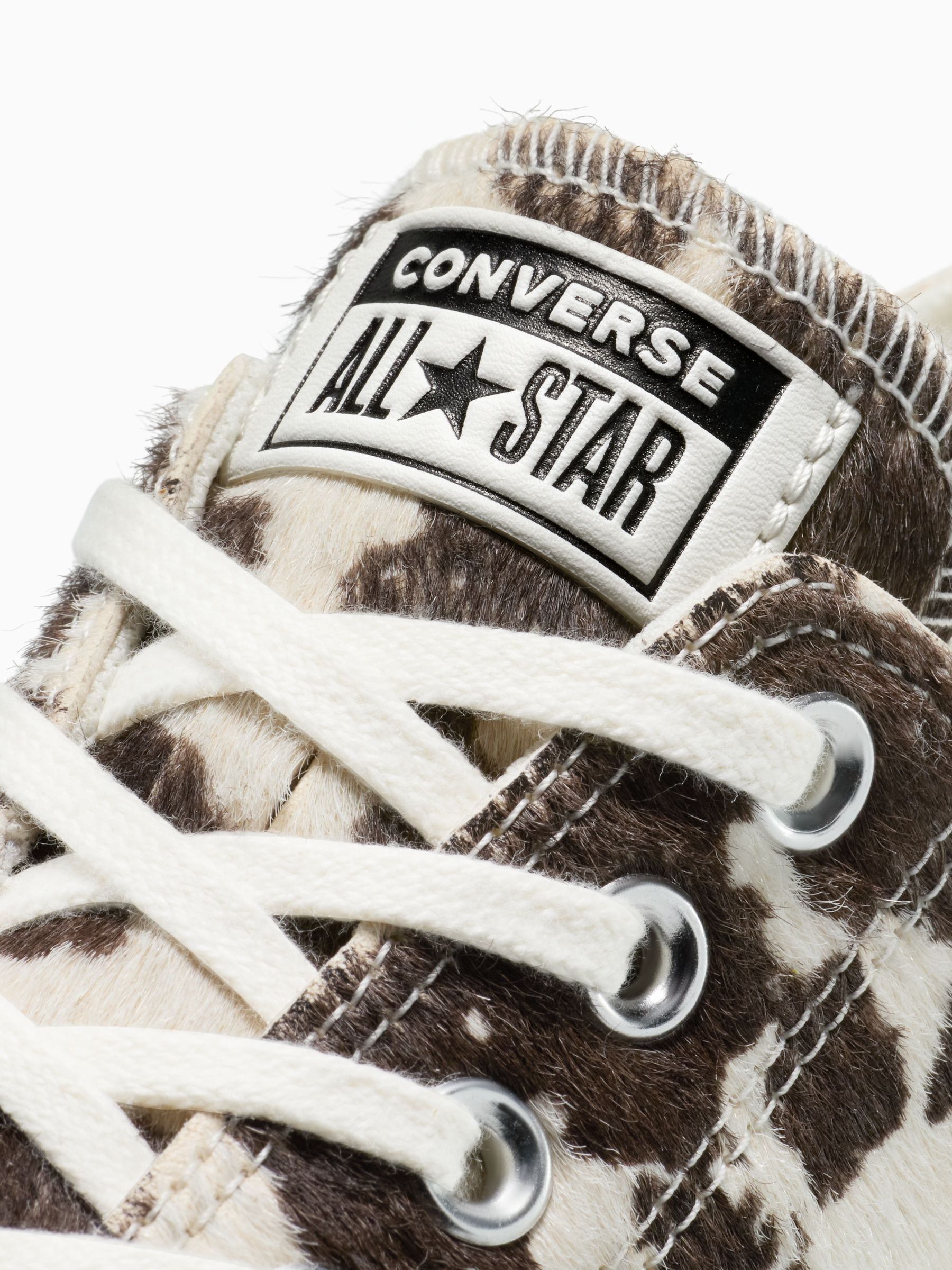 Buy Converse Brown/White Pony Cow Print All Over Low Trainers from