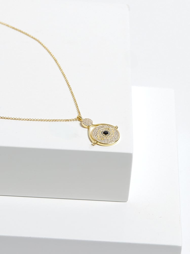Inicio Gold Tone Evil Eye And Mother Of Pearl Spinning Necklaces- Gift Pouch - Image 3 of 4