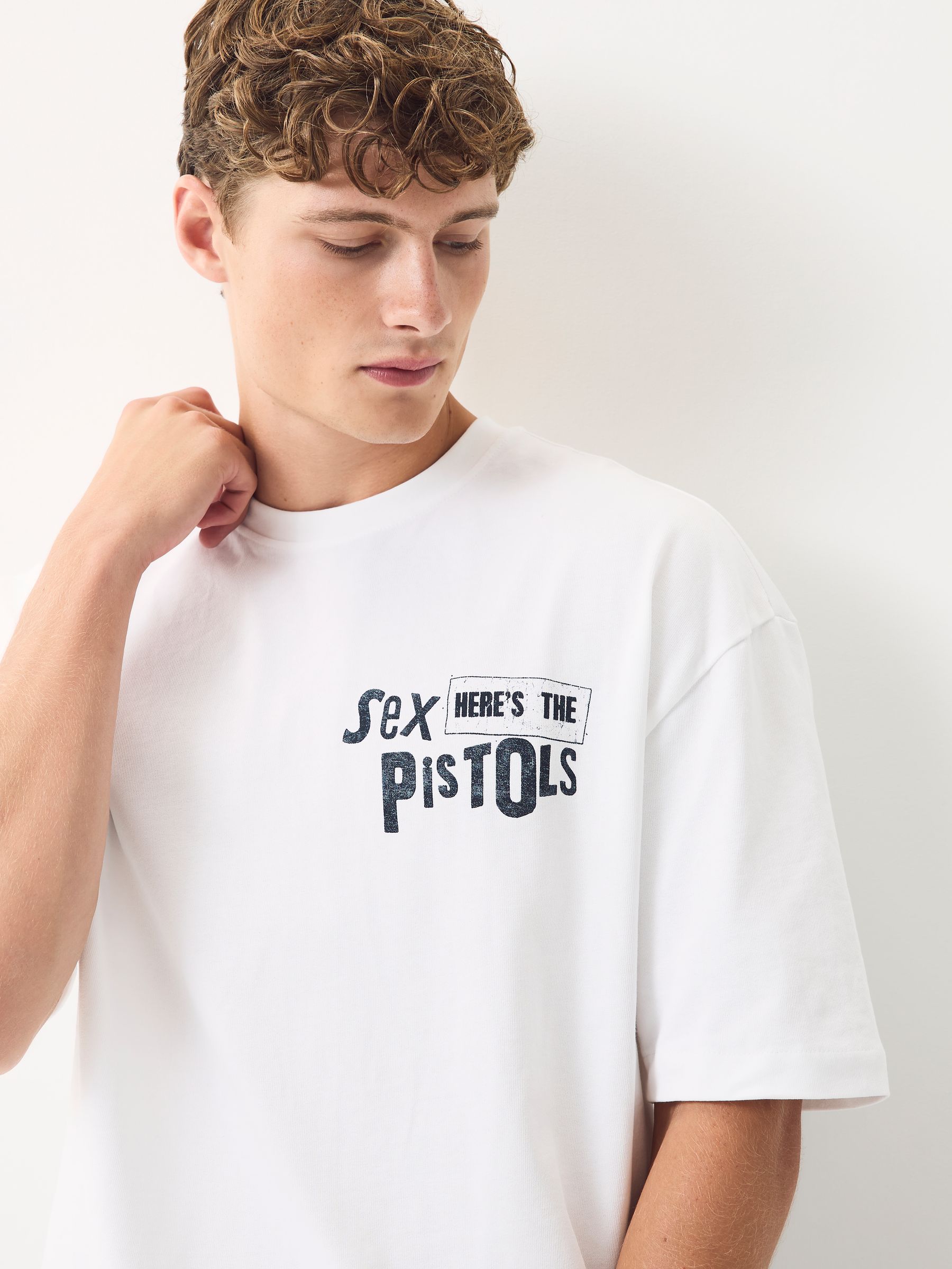 Buy Sex Pistols White Relaxed Fit Band Graphic Print T-Shirt from