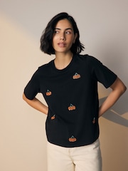 Black Halloween Pumpkin Sparkle Short Sleeve T-Shirt - Image 1 of 7