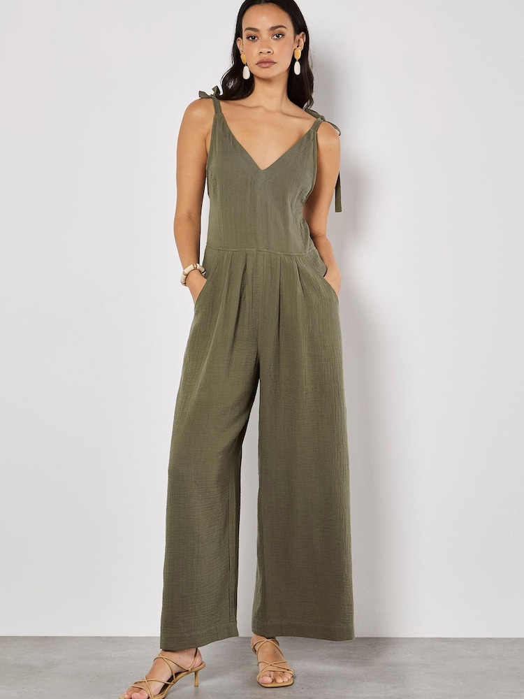 Apricot Green Tetra Tie Shoulder 100% Cotton Jumpsuit - Image 1 of 5 Apricot Green Tetra Tie Shoulder 100% Cotton Jumpsuit - Image 1 of 5
