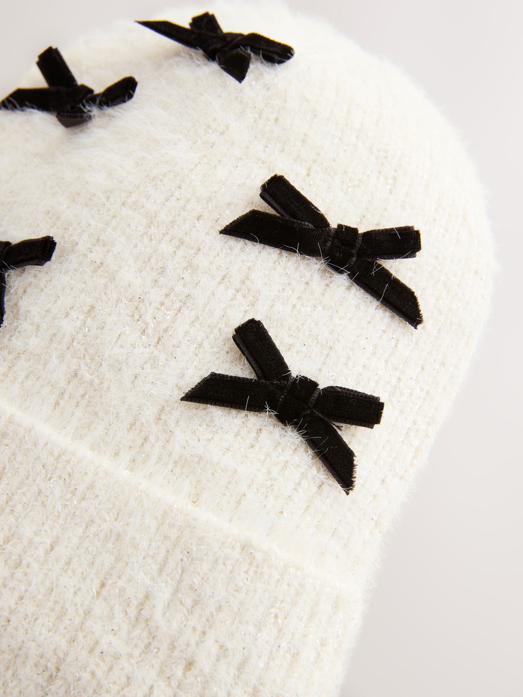 C♡E Buy Black/Ecru Bow Beanie Hat (1-16yrs) from Next Romania