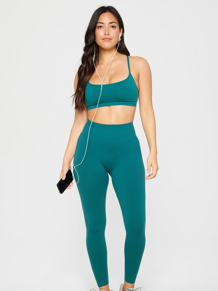 Fabletics Green Sleek Seamless Strappy Low Impact Bra - Image 1 of 4 Fabletics Green Sleek Seamless Strappy Low Impact Bra - Image 1 of 4