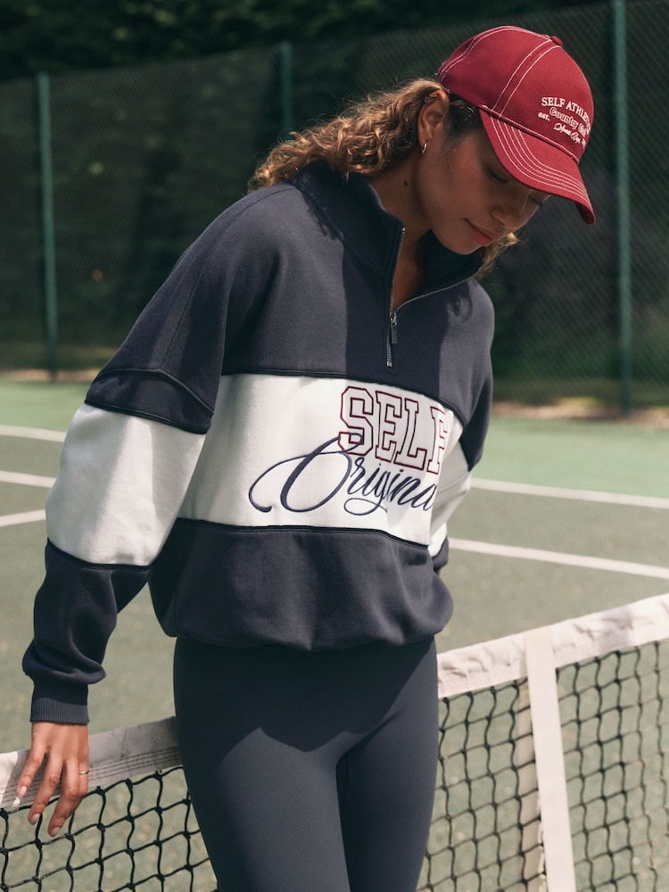 self. Embroidered Half Zip Sweatshirt - Bild 1 von 10
