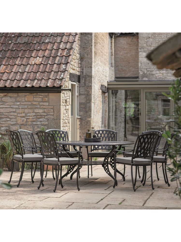 Bramblecrest Black Rome Garden Elliptical Table with 8 Armchairs and Cushions - Image 1 of 5