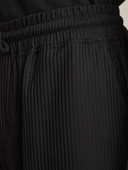 Reiss Black Rowden Textured-Knit Tapered Trousers - Image 4 of 6