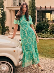 Friends Like These Green Geo Short Sleeve Chiffon Tiered Maxi Dress - Image 1 of 5