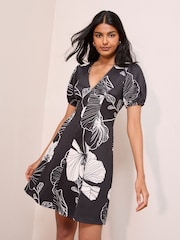 Friends Like These Black Floral Stencil V-Neck Puff Sleeve Structured Mini Dress - Image 1 of 4