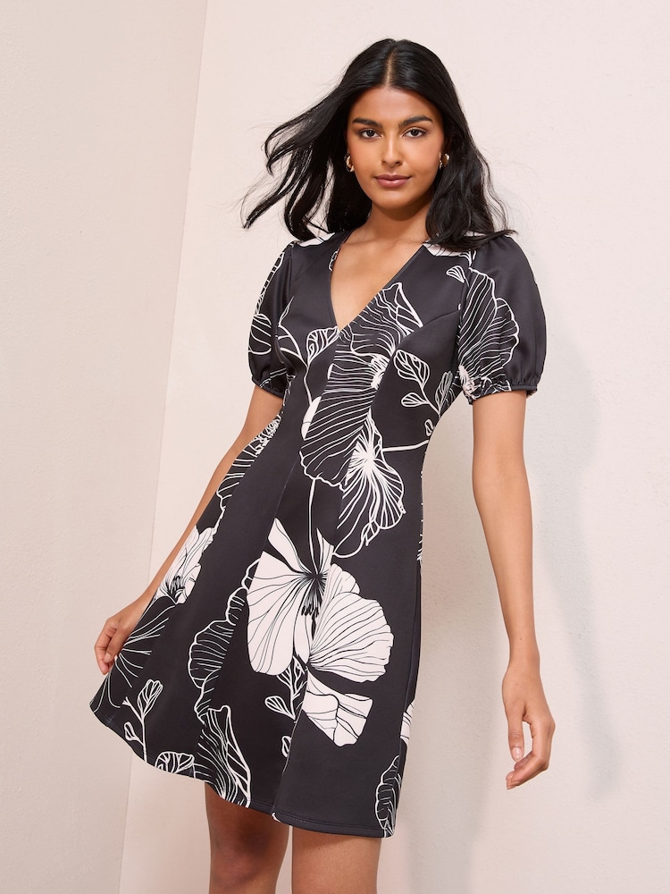 Friends Like These Black Floral Stencil V-Neck Puff Sleeve Structured Mini Dress - Image 1 of 4
