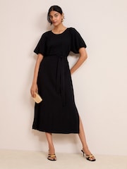 Friends Like These Black Puff Sleeve Raglan Tie Waist Belt Midi Dress - Image 1 of 5