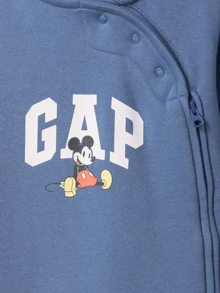 Mochila escolar azul - Pijama tipo pelele con capucha, diseño de Disney y logo para bebé de Gap (recién nacido - 12 meses) - Imagen 3 de 3