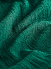Verde - Pantalones de gasa de algodón 100 % en tejido arrugado y pernera tipo barril de Gap - Imagen 9 de 12