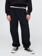 Negro - Pantalones de chándal suaves con forro polar y logo de estilo vintage de Gap (4-13 años) - Imagen 1 de 4