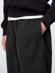Negro - Pantalones de chándal suaves con forro polar y logo de estilo vintage de Gap (4-13 años) - Imagen 3 de 4